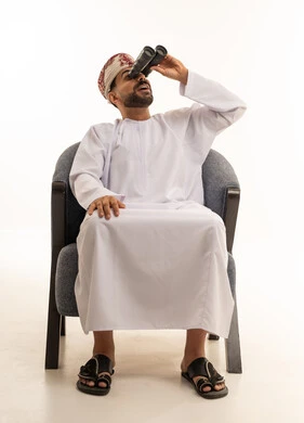Omani Man with Binoculars in Traditional Dress