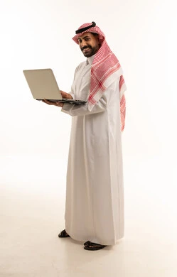Saudi Man Holding Laptop on White Background