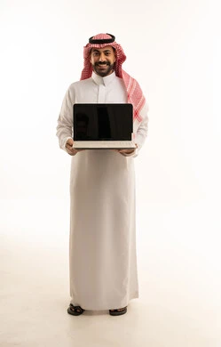 Saudi Man Holding Laptop on White Background