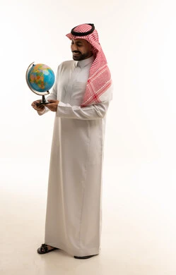 Saudi Man Holding World Globe on White Background