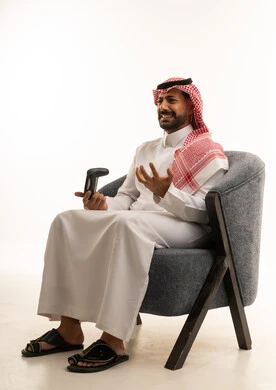 Saudi Man Frustrated Playing Video Games in Studio