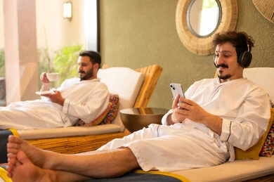 Arab Men Relaxing in Luxury Wellness Spa with Technology
