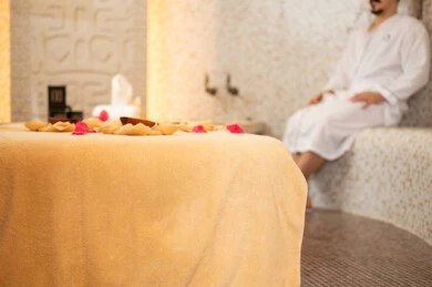 Arab Man in White Bathrobe at Luxury Spa Resort