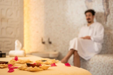 Arab Man in White Bathrobe at Luxury Spa
