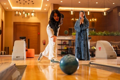 Saudi Women Playing Bowling in Recreational Center