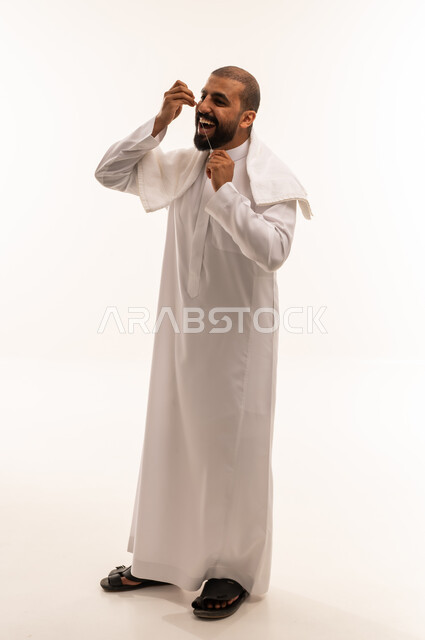 Saudi Man Using Traditional Miswak on White Background