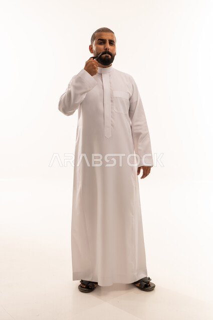 Saudi Man in White Thobe with Smoking Pipe Studio
