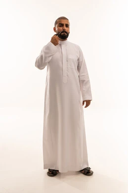 Saudi Man in White Thobe with Smoking Pipe Studio