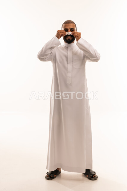 Saudi Man in Traditional Thobe with Paper Mustache Portrait