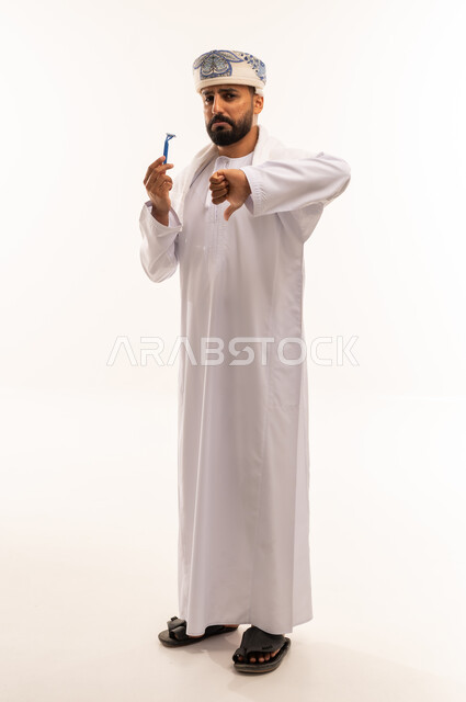Omani Man with Razor Giving Thumbs Down Sign