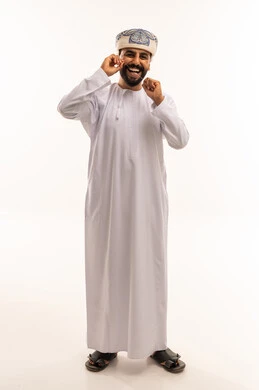 Smiling Omani Man in Traditional White Dishdasha