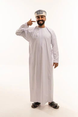 Omani Man in Traditional Dishdasha and Kummah