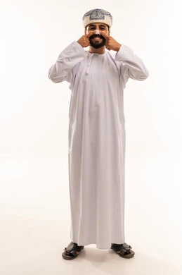 Omani Man in Traditional Dishdasha and Kumma on White
