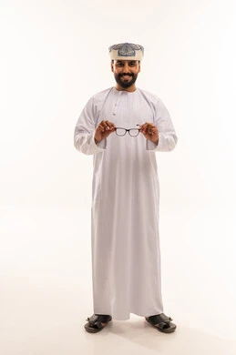 Omani Man Wearing Traditional Dishdasha and Glasses