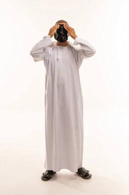 Omani Man in White Dishdasha Wearing Black Mask