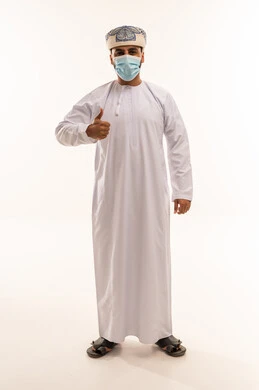 Omani Man in Traditional Dress Wearing Face Mask
