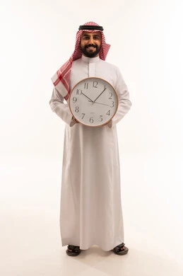 Saudi Man Holding Large Wall Clock on White Background