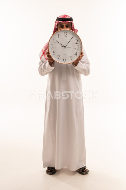Saudi Man Holding Wall Clock on White Background