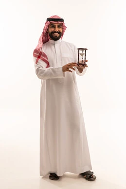 Saudi Man Holding Hourglass on White Background