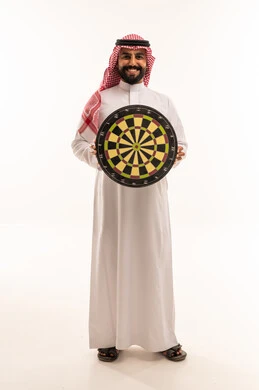 Saudi Man Holding Dartboard on White Background