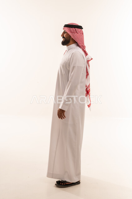 Saudi Man in Traditional Thobe Side Profile View