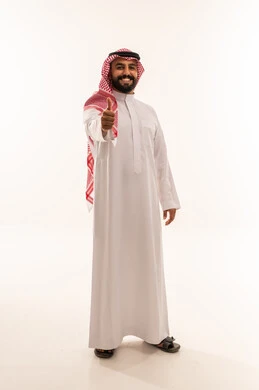 Saudi Man in Traditional Thobe Giving Thumbs Up Gesture