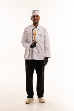 Saudi Chef in Professional Uniform with Spatula
