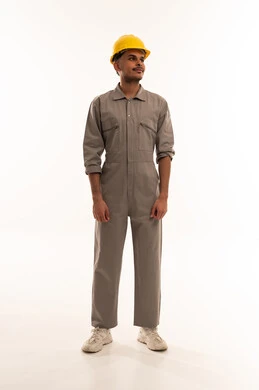 Saudi Construction Worker in Grey Jumpsuit and Yellow Helmet