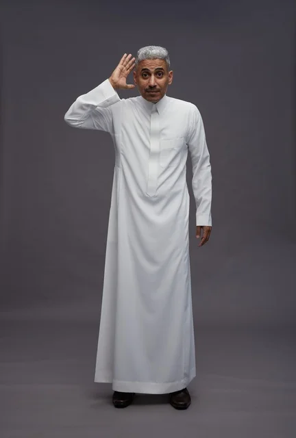 Saudi Man in White Thobe Listening Studio Portrait
