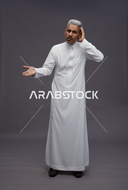 Saudi Man in White Thobe with a Confused Expression