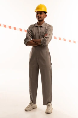Saudi Worker in Grey Jumpsuit and Yellow Helmet