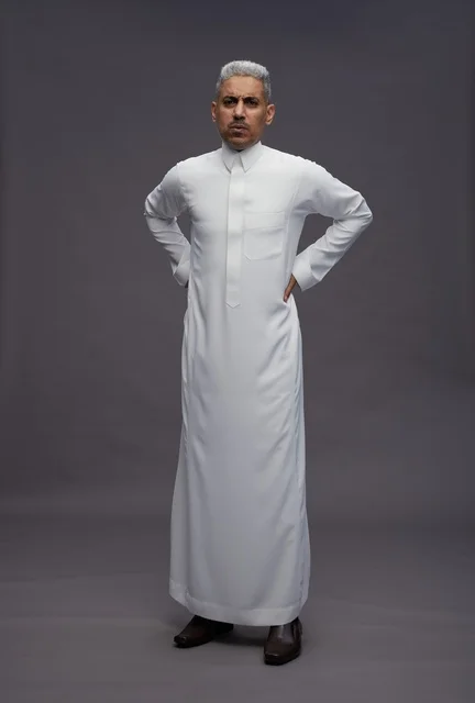 Saudi Man in White Thobe on Grey Background