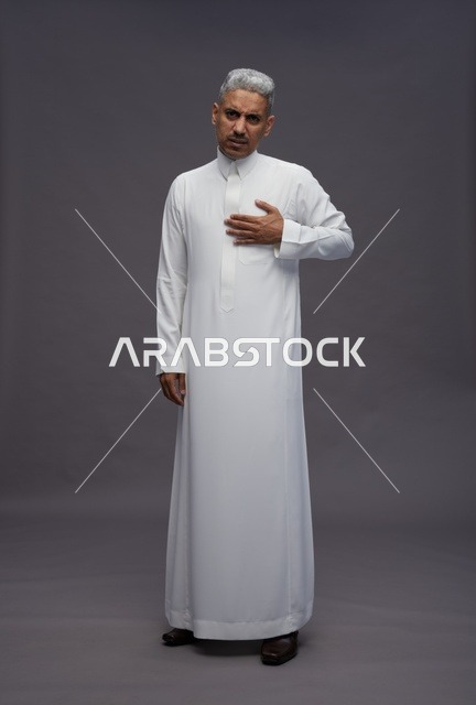 Saudi Man in Traditional White Thobe Studio Portrait