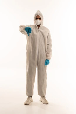 Arab Man in White Hazmat Suit with Thumbs Down