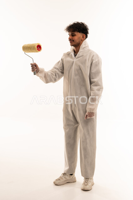 Saudi Painter in White Protective Coverall with Roller
