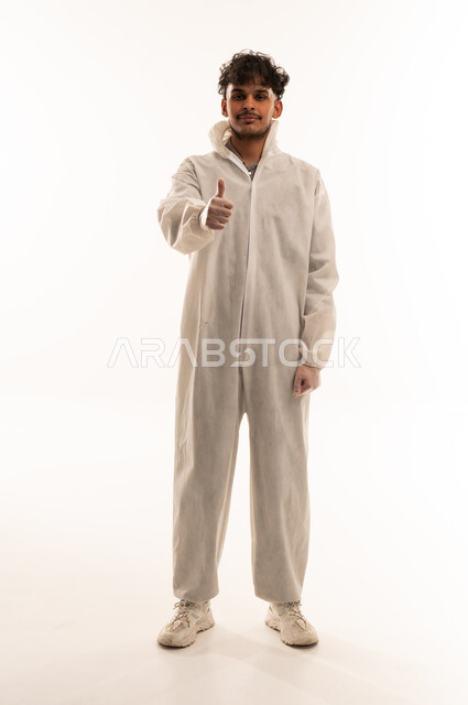Arab Male Worker in White Protective Suit Thumbs Up