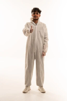 Arab Male Worker in White Protective Suit Thumbs Up