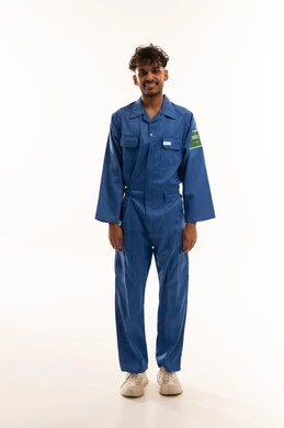 Saudi Technician in Blue Work Jumpsuit on White Background