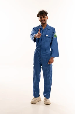 Saudi Technician in Blue Jumpsuit with Thumbs Up Gesture