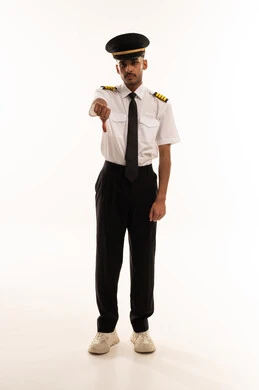 Saudi Pilot in Uniform Giving Thumbs Down Sign