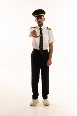 Arab Pilot in Uniform Making Stop Gesture White Background