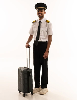 Saudi Pilot in Uniform with Suitcase on White Background