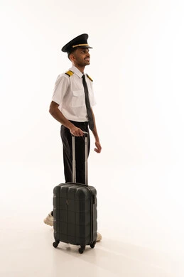 Saudi Airline Pilot with Suitcase on White Background