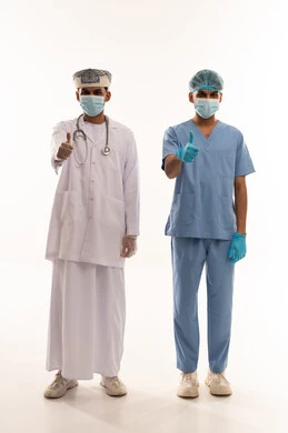 Omani Doctor and Nurse in Medical Uniforms