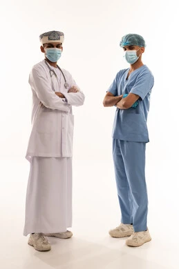 Omani Doctor and Nurse in Medical Uniform
