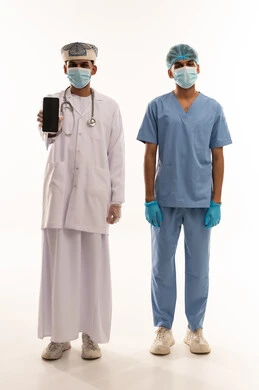 Omani Doctor and Nurse Holding Smartphone on White Background