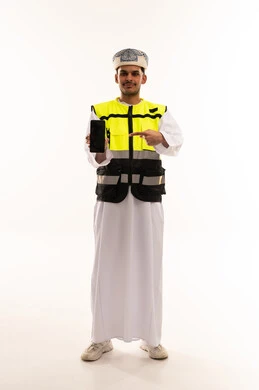 Omani Man in Safety Vest Holding Smartphone