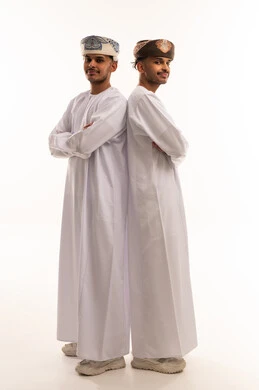Omani Men in Traditional Dishdasha on White Background