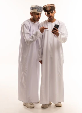 Omani Men Looking at Smartphone on White Background