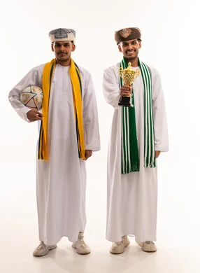 Omani Men with Soccer Ball and Trophy